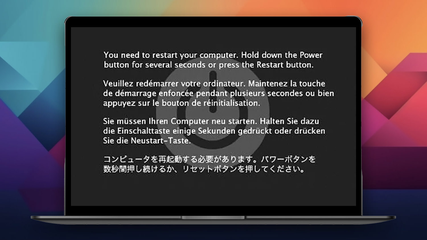 Η τυπική οθόνη kernel panic στον Mac — μήνυμα restart σε πέντε γλώσσες