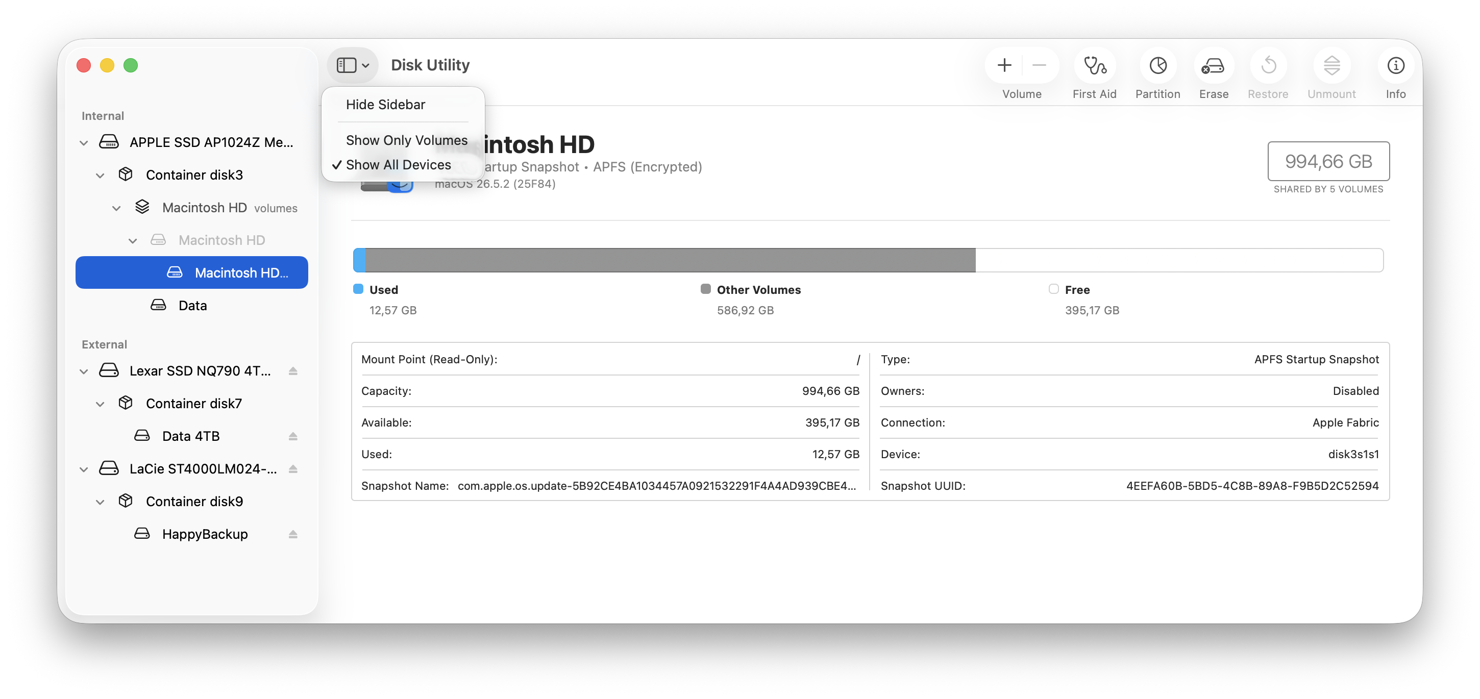 Βοήθημα δίσκων σε macOS με ανοιχτό το μενού της πλαϊνής στήλης και τσεκαρισμένο το Show All Devices — στην πλαϊνή στήλη φαίνονται εσωτερικός δίσκος και δύο εξωτερικοί (SSD και LaCie)